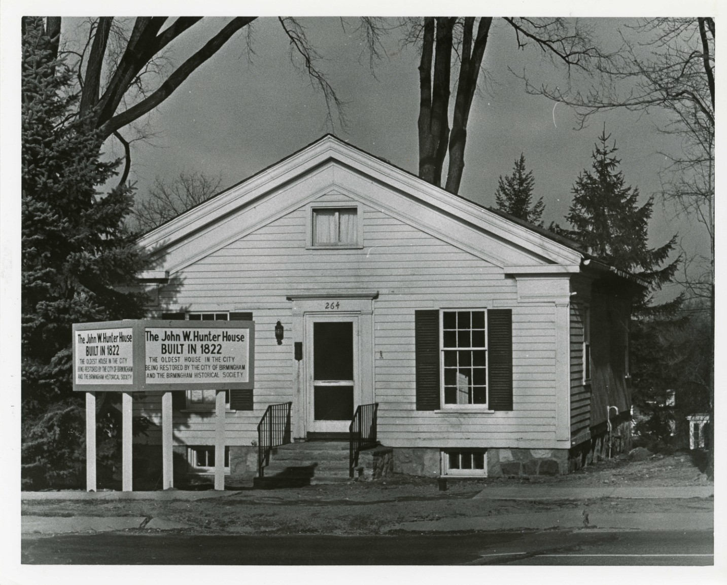 1. NAME
COMMON: John W. Hunter
AND/OR HISTORIC: John W. Hunter
2. LOCATION
STREET AND NUMBER: 556 West Maple
CITY OR TOWN: Birmingham
STATE: Michigan
CODE: 26
COUNTY: Oakland
COUNTY: Oakland
CODE: 126
3. PHOTO REFERENCE
PHOTO CREDIT: Michigan Historical Commission
DATE OF PHOTO: December, 1970
NEGATIVE FILED AT: Michigan Historical Commission
4. IDENTIFICATION
DESCRIBE VIEW, DIRECTION, ETC. The front of the house is shown; the house faces south.