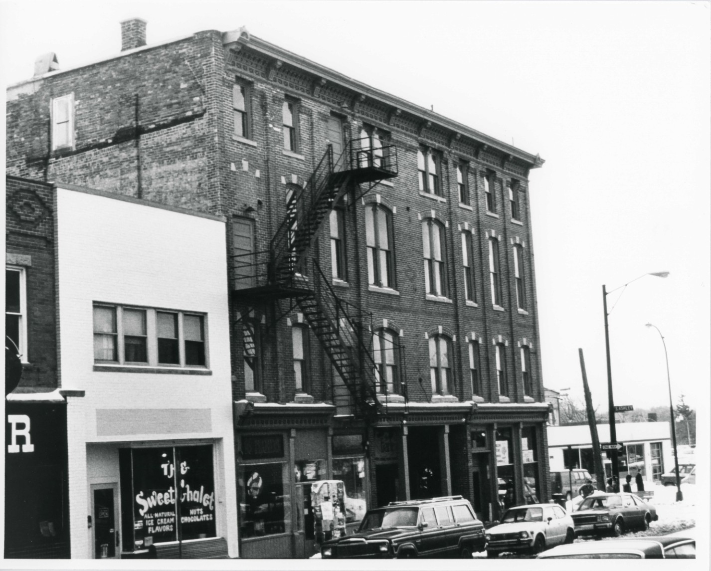 Site: Germania Hotel Complex (Germania Hotel/Staebler and Sons Garage) Location: 119-123 W. Washington 209-211 S. Ashley St. Ann Arbor, Washtenaw County, Michigan Photographer: Terry L. Alexander Date: March, 1982 Negative: Terry L. Alexander, Architect 225 S. Ashley, Suite 201 Ann Arbor, MI 48104 View: Camera facing WSW (General facade) Photo: #1 of 7